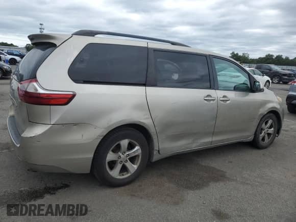 2015 Toyota Sienna LE AAS with VIN 5TDKK3DC6FS641006, listed as a Copart auction lot 69465255 with 200,844 mi miles and Clean title. Bid and sale history available at DreamBid. Image 3.