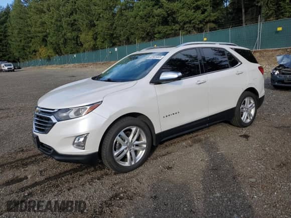 2020 Chevrolet Equinox Premier z VIN 3GNAXYEX4LS649048, wystawiony jako Copart lot #82503455 z przebiegiem 53 437 mil mil oraz Szkoda całkowita • Salvage title. Historia ofert i sprzedaży dostępna na DreamBid. Obrazek 1.