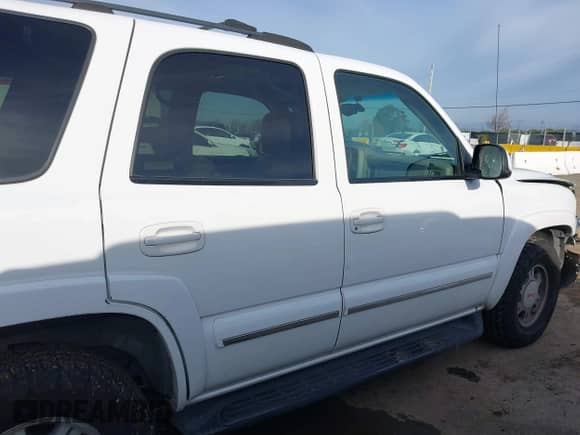 2002 Chevrolet Tahoe Z71 z VIN 1GNEK13Z42R256342, wystawiony jako IAAI lot #41838869 z przebiegiem 230 351 mil mil oraz . Historia ofert i sprzedaży dostępna na DreamBid. Obrazek 13.