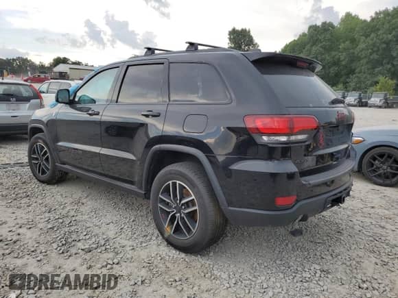 2020 Jeep Grand Cherokee Trailhawk with VIN 1C4RJFLT2LC296476, listed as a Copart auction lot 62125625 with 75,642 mi miles and Salvage title. Bid and sale history available at DreamBid. Image 2.