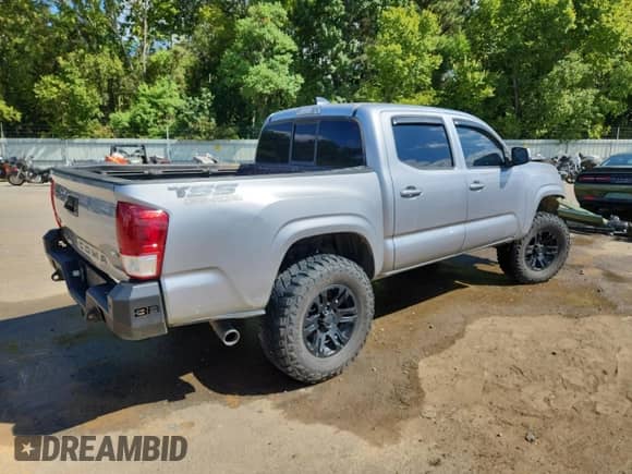 2020 Toyota Tacoma SR5 z VIN 3TMCZ5AN1LM311240, wystawiony jako Copart lot #85188965 z przebiegiem 149 027 mil mil oraz Szkoda całkowita • Salvage title. Historia ofert i sprzedaży dostępna na DreamBid. Obrazek 3.