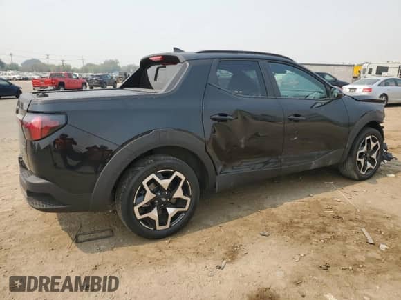 2022 Hyundai Santa Cruz Limited с VIN 5NTJEDAF4NH027181, выставлен на аукционе Copart как лот 69159494 с пробегом Не указан миль и Списание • Salvage title. История ставок и продаж доступна на DreamBid. Изображение 3.