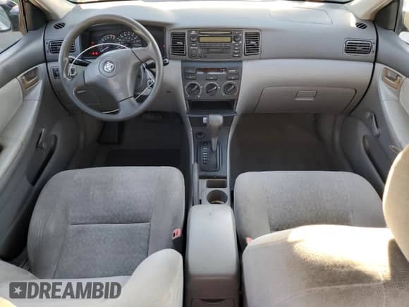 2004 Toyota Corolla CE z VIN 1NXBR32E24Z256577, wystawiony jako Copart lot #86673345 z przebiegiem Nie podano mil oraz Szkoda całkowita • Salvage title. Historia ofert i sprzedaży dostępna na DreamBid. Obrazek 8.