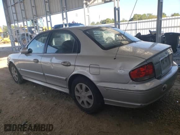 2003 Hyundai Sonata с VIN KMHWF25S23A840337, выставлен на аукционе Copart как лот 83940525 с пробегом 306 986 миль миль и Списание • Salvage title. История ставок и продаж доступна на DreamBid. Изображение 2.