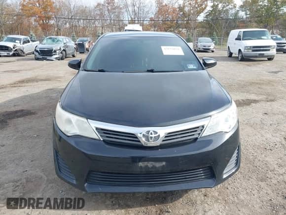 2014 Toyota Camry XLE with VIN 4T4BF1FK2ER354562, listed as a IAAI auction lot 43554838 with 197,062 mi miles and . Bid and sale history available at DreamBid. Image 6.