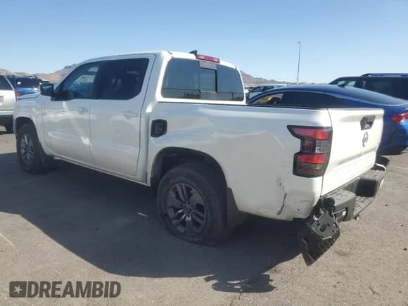 2025 Nissan Frontier Pro-4X with VIN 1N6ED1EK7SN609275, listed as a Copart auction lot 71829345 with 1,759 mi miles and Salvage title. Bid and sale history available at DreamBid. Image 2.