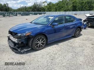 2023 Toyota Camry Hybrid SE with VIN 4T1S31AK7PU058076, listed as a Copart auction lot 62368915 with 24,093 mi miles and Salvage title. Bid and sale history available at DreamBid. Image 1.