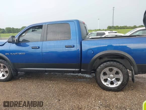 2011 Ram 1500 Big Horn with VIN 1D7RV1CT3BS557941, listed as a IAAI auction lot 42867361 with 136,640 mi miles and . Bid and sale history available at DreamBid. Image 14.