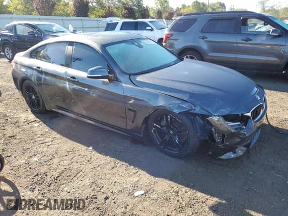 2018 BMW 4 Series 440i xDrive with VIN WBA4J7C56JBB98944, listed as a Copart auction lot 70683675 with 94,719 mi miles and Salvage title. Bid and sale history available at DreamBid. Image 4.