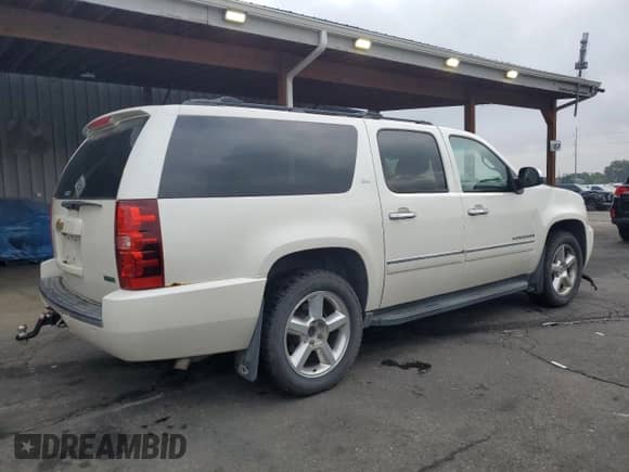 2011 Chevrolet Suburban LTZ с VIN 1GNSKKE3XBR223816, выставлен на аукционе Copart как лот 70764605 с пробегом 166 032 миль миль и Списание • Salvage title. История ставок и продаж доступна на DreamBid. Изображение 3.