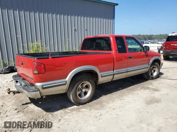 1999 Chevrolet S-10 LS with VIN 1GCCS19X1X8100889, listed as a Copart auction lot 84554115 with 100,468 mi miles and Salvage title. Bid and sale history available at DreamBid. Image 3.