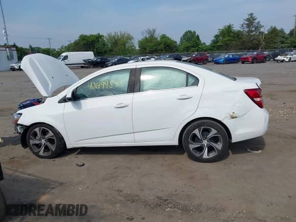 2017 Chevrolet Sonic Premier with VIN 1G1JF5SB5H4118976, listed as a IAAI auction lot 42499383 with 144,035 mi miles and . Bid and sale history available at DreamBid. Image 15.