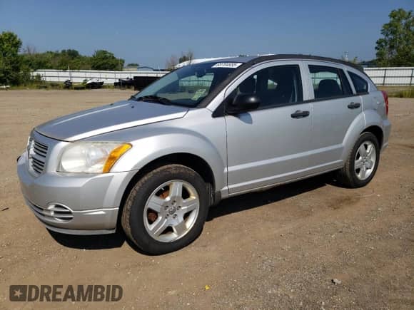 2011 Dodge Caliber z VIN 1B3CB1HA3BD296851, wystawiony jako Copart lot #68704655 z przebiegiem 113 601 mil mil oraz Czysty tytuł • Clean title. Historia ofert i sprzedaży dostępna na DreamBid. Obrazek 1.