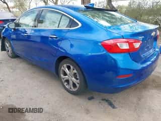 2016 Chevrolet Cruze Premier z VIN 1G1BG5SM3G7271551, wystawiony jako IAAI lot #42988853 z przebiegiem 87 746 mil mil oraz . Historia ofert i sprzedaży dostępna na DreamBid. Obrazek 3.