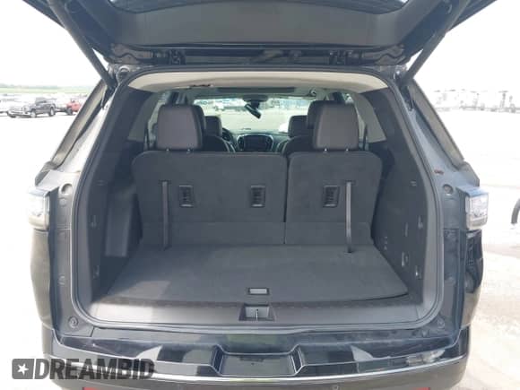 2021 Chevrolet Traverse Premier with VIN 1GNEVKKW6MJ245896, listed as a IAAI auction lot 42573984 with 56,484 mi miles and . Bid and sale history available at DreamBid. Image 17.