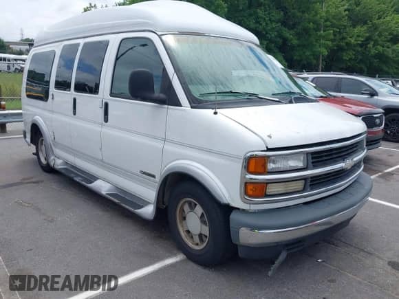1999 Chevrolet Express z VIN 1GBFG15R6X1096731, wystawiony jako IAAI lot #42705801 z przebiegiem 283 008 mil mil oraz . Historia ofert i sprzedaży dostępna na DreamBid. Obrazek 1.