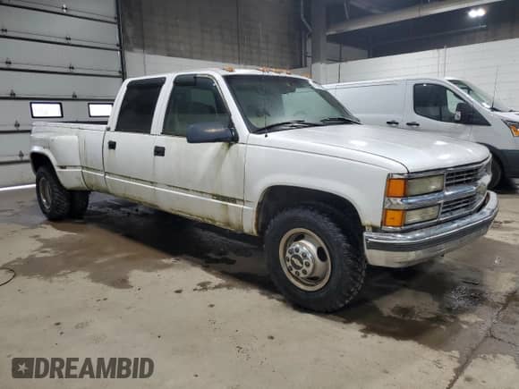 1997 Chevrolet Silverado 3500 с VIN 1GCHC33J5VF002668, выставлен на аукционе Copart как лот 87199575 с пробегом 156 834 миль миль и Чистый • Clean title. История ставок и продаж доступна на DreamBid. Изображение 4.