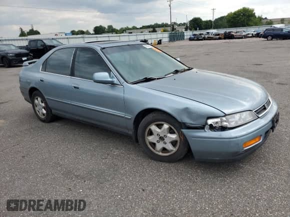 1995 Honda Accord with VIN 1HGCE6660SA003024, listed as a Copart auction lot 66928635 with 95,299 mi miles and Salvage title. Bid and sale history available at DreamBid. Image 4.