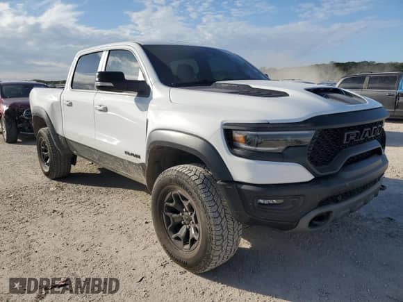 2022 Ram 1500 TRX с VIN 1C6SRFU91NN252416, выставлен на аукционе Copart как лот 85870095 с пробегом 64 500 миль миль и Списание • Salvage title. История ставок и продаж доступна на DreamBid. Изображение 4.