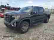 2020 GMC Sierra 1500 AT4 с VIN 3GTU9EET2LG346347, выставлен на аукционе Copart как лот 61020065 с пробегом 88 980 миль миль и Списание • Salvage title. История ставок и продаж доступна на DreamBid. Изображение 1.
