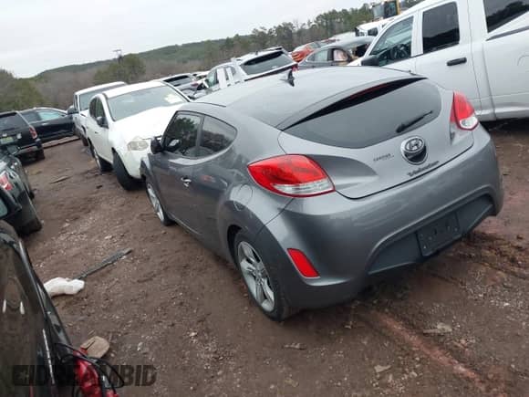 2015 Hyundai Veloster with VIN KMHTC6AD3FU232825, listed as a IAAI auction lot 41243484 with 92,748 mi miles and . Bid and sale history available at DreamBid. Image 3.