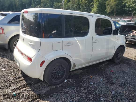 2010 Nissan Cube SL с VIN JN8AZ2KR8AT168118, выставлен на аукционе Copart как лот 71653125 с пробегом 195 388 миль миль и Списание • Salvage title. История ставок и продаж доступна на DreamBid. Изображение 3.