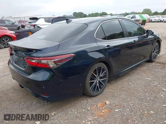 2021 Toyota Camry SE Nightshade z VIN 4T1T11AK9MU430894, wystawiony jako IAAI lot #43127250 z przebiegiem 80 059 mil mil oraz . Historia ofert i sprzedaży dostępna na DreamBid. Obrazek 4.