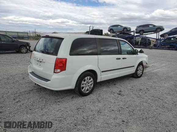 2016 Dodge Grand Caravan American Value with VIN 2C4RDGBG3GR258852, listed as a Copart auction lot 84599625 with 116,185 mi miles and Salvage title. Bid and sale history available at DreamBid. Image 3.