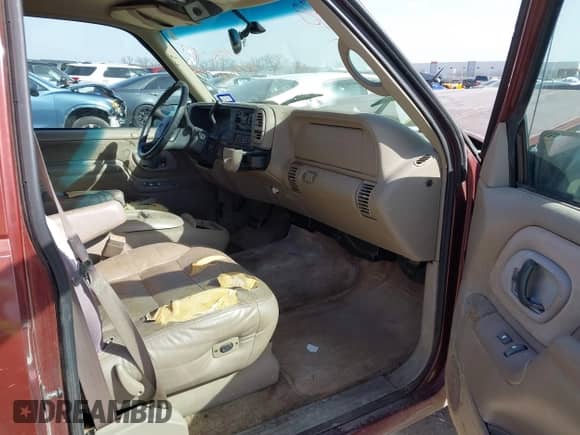 1999 Chevrolet Tahoe with VIN 1GNEC13R9XJ341261, listed as a IAAI auction lot 41741710 with 234,676 mi miles and . Bid and sale history available at DreamBid. Image 5.