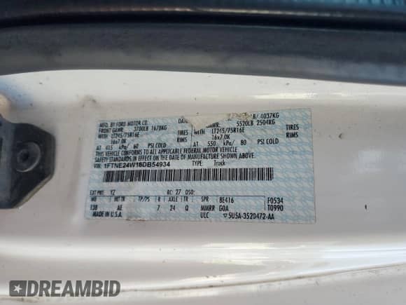 2008 Ford Econoline Cargo Commercial with VIN 1FTNE24W18DB54934, listed as a Copart auction lot 61996885 with 181,909 mi miles and Salvage title. Bid and sale history available at DreamBid. Image 13.