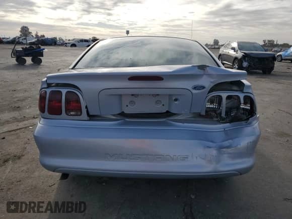1996 Ford Mustang z VIN 1FALP4047TF106715, wystawiony jako Copart lot #78658044 z przebiegiem 60 205 mil mil oraz Szkoda całkowita • Salvage title. Historia ofert i sprzedaży dostępna na DreamBid. Obrazek 6.