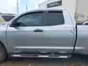 2012 Toyota Tundra z VIN 5TFRU5F14CX027982, wystawiony jako IAAI lot #42369647 z przebiegiem 169 286 mil mil oraz . Historia ofert i sprzedaży dostępna na DreamBid. Obrazek 14.