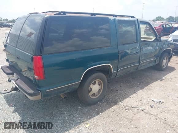 1995 Chevrolet Suburban with VIN 1GNEC16K2SJ320128, listed as a IAAI auction lot 42607381 with 226,987 mi miles and . Bid and sale history available at DreamBid. Image 4.