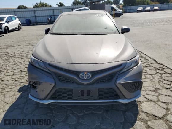2023 Toyota Camry Hybrid XSE с VIN 4T1K31AK6PU615026, выставлен на аукционе Copart как лот 83769475 с пробегом 141 199 миль миль и Списание • Salvage title. История ставок и продаж доступна на DreamBid. Изображение 5.