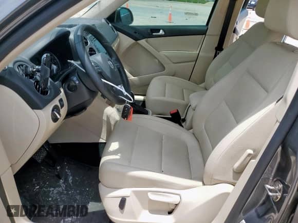 2014 Volkswagen Tiguan SEL z VIN WVGAV3AX7EW506170, wystawiony jako Copart lot #58852355 z przebiegiem 55 961 mil mil oraz Szkoda całkowita • Salvage title. Historia ofert i sprzedaży dostępna na DreamBid. Obrazek 7.