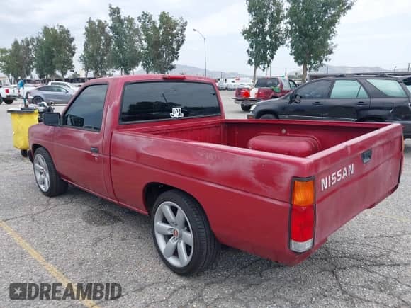 1994 Nissan Frontier with VIN 1N6SD11S3RC356695, listed as a IAAI auction lot 42408659 with 187,376 mi miles and . Bid and sale history available at DreamBid. Image 3.