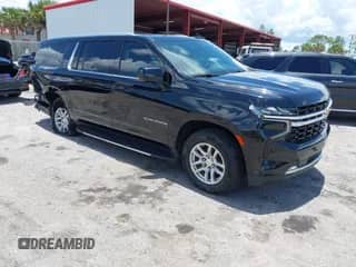 2021 Chevrolet Suburban LS z VIN 1GNSCBKD2MR408228, wystawiony jako IAAI lot #42484734 z przebiegiem 182 987 mil mil oraz . Historia ofert i sprzedaży dostępna na DreamBid. Obrazek 1.