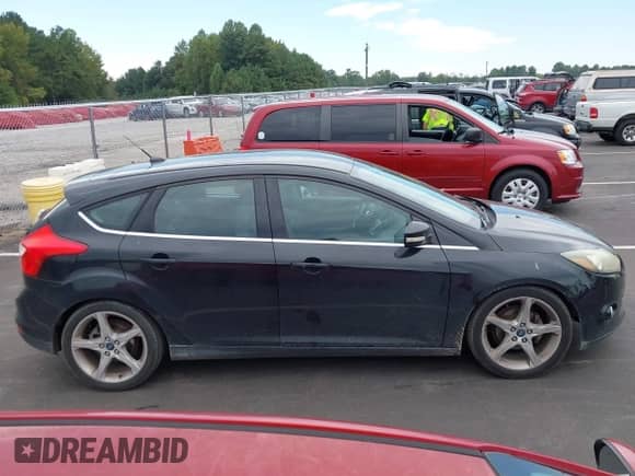 2014 Ford Focus Titanium with VIN 1FADP3N27EL114825, listed as a IAAI auction lot 43217005 with 148,002 mi miles and . Bid and sale history available at DreamBid. Image 13.