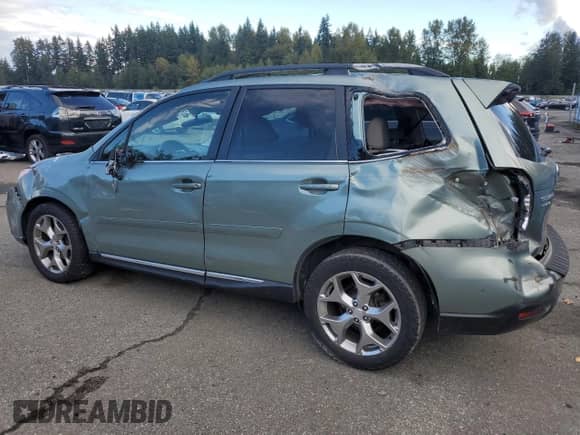 2015 Subaru Forester Touring with VIN JF2SJAWC5FH594724, listed as a Copart auction lot 84658235 with 72,361 mi miles and Salvage title. Bid and sale history available at DreamBid. Image 2.