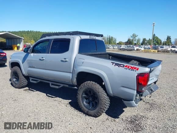 2019 Toyota Tacoma SR z VIN 5TFCZ5AN8KX193437, wystawiony jako IAAI lot #43278180 z przebiegiem 70 048 mil mil oraz . Historia ofert i sprzedaży dostępna na DreamBid. Obrazek 3.