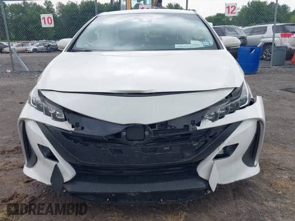 2018 Toyota Prius Plus z VIN JTDKARFP9J3098945, wystawiony jako IAAI lot #42471552 z przebiegiem 164 405 mil mil oraz . Historia ofert i sprzedaży dostępna na DreamBid. Obrazek 13.