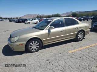 2003 Hyundai Sonata with VIN KMHWF25H33A806380, listed as a Copart auction lot 71670965 with 84,477 mi miles and Salvage title. Bid and sale history available at DreamBid. Image 1.
