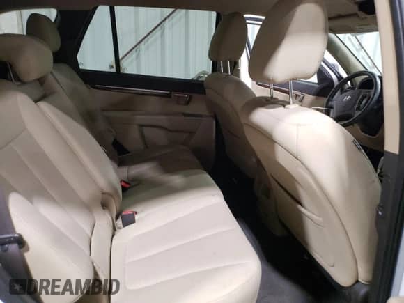 2012 Hyundai Santa Fe GLS с VIN 5XYZGDAG9CG105222, выставлен на аукционе Copart как лот 66408115 с пробегом 93 508 миль миль и Списание • Salvage title. История ставок и продаж доступна на DreamBid. Изображение 11.