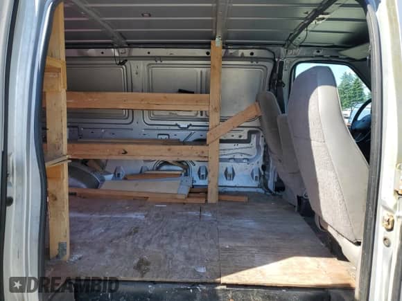 1997 Ford Econoline Cargo с VIN 1FTFE2425VHB34899, выставлен на аукционе Copart как лот 58582755 с пробегом 169 999 миль миль и Списание • Salvage title. История ставок и продаж доступна на DreamBid. Изображение 11.