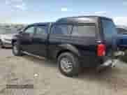 2015 Nissan Frontier SL with VIN 1N6AD0FVXFN736920, listed as a Copart auction lot 68226395 with 145,479 mi miles and Salvage title. Bid and sale history available at DreamBid. Image 2.