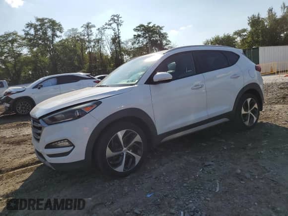 2017 Hyundai Tucson Eco z VIN KM8J33A28HU293563, wystawiony jako Copart lot #80352605 z przebiegiem 206 911 mil mil oraz Czysty tytuł • Clean title. Historia ofert i sprzedaży dostępna na DreamBid. Obrazek 1.