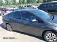 2018 Toyota Prius Plus z VIN JTDKARFP1J3071500, wystawiony jako IAAI lot #42665651 z przebiegiem 168 014 mil mil oraz . Historia ofert i sprzedaży dostępna na DreamBid. Obrazek 14.