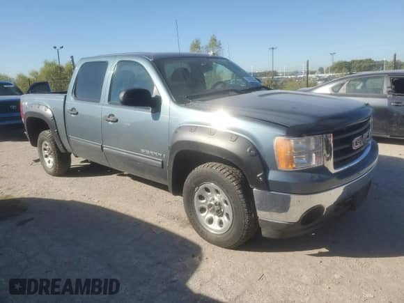 2008 GMC Sierra 1500 SL with VIN 2GTEK13C281133273, listed as a Copart auction lot 74211334 with 188,476 mi miles and Salvage title. Bid and sale history available at DreamBid. Image 4.
