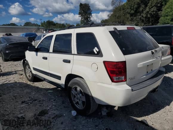 2006 Jeep Grand Cherokee Laredo z VIN 1J4GR48K36C142412, wystawiony jako Copart lot #84759255 z przebiegiem 121 879 mil mil oraz Czysty tytuł • Clean title. Historia ofert i sprzedaży dostępna na DreamBid. Obrazek 2.