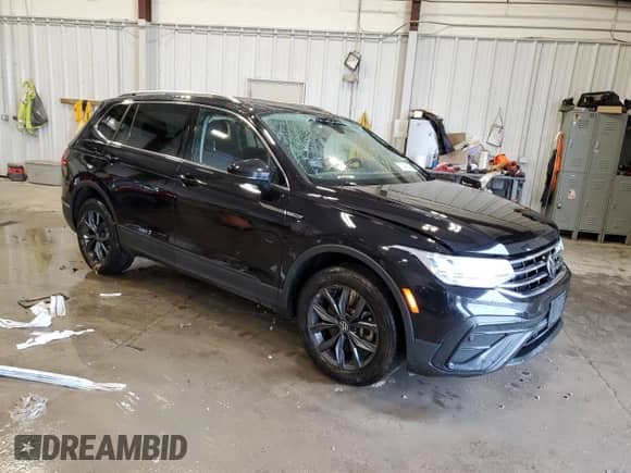 2022 Volkswagen Tiguan SE with VIN 3VV2B7AX5NM111365, listed as a Copart auction lot 57442545 with 93,657 mi miles and Salvage title. Bid and sale history available at DreamBid. Image 4.